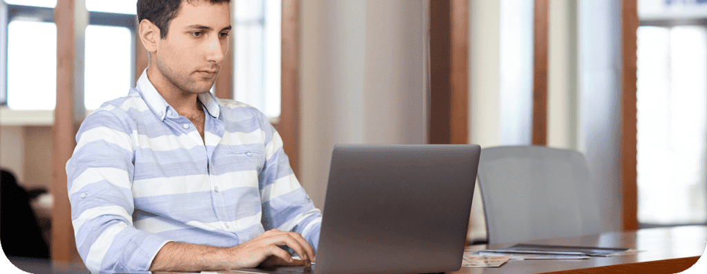 man working on laptop